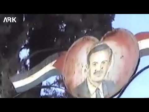 تمزيق صور حافظ الأسد في انتفاضة 2004 في عفرين