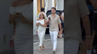 Beautiful Lovely Rich Couple Walking Through Puerto B