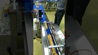 Swiss roll packaging machine， Swiss roll wrapping machine, bread packaging system/ flow pack