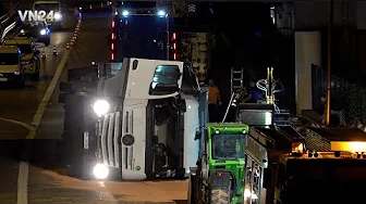 VN24 - Semitrailer with empty beer bottles tilts on its side - recovery turns into water games
