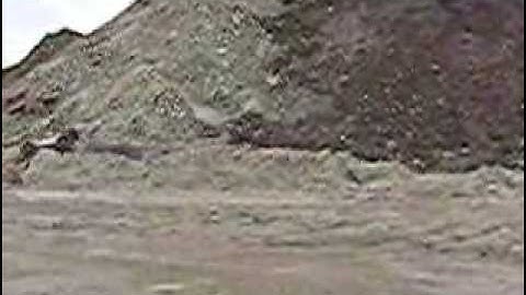 E-revo + E-maxx, Jumps, Flips, and Dirt