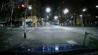 Melbourne CBD at night under curfew.
