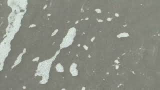 "Crawling" music video with abstract slow mo ocean waves
