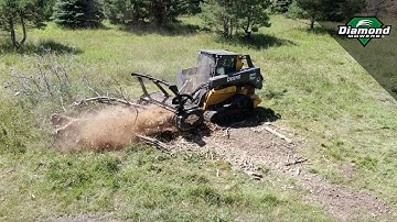 Skid-Steer Drum Mulcher Vs. Burn Pile - Diamond Mowers