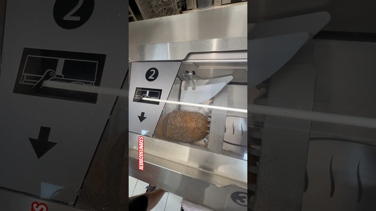 Como se corta el pan con una máquina. Cómo cortar el pan perfectamente igual. Corte perfecto.