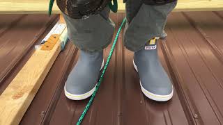 Walking in my nonslip shoes on metal roof install. 8/12 pitch