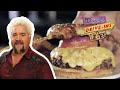 Guy Fieri Eats a Bacon BBQ Brisket Cheeseburger | Diners, Drive-Ins and Dives