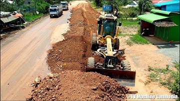 Powerful Motor Grader With Driving Skill Operating Pushing And Spreading Build Foundation Road