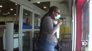 Police search for woman who went on shopping spree with stolen credit card