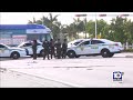 Police officers investigate crash in Miami-Dade
