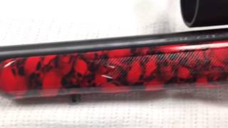 Red,white,blue rifle