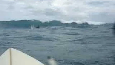 Bryan surfs on wind day at Hickam