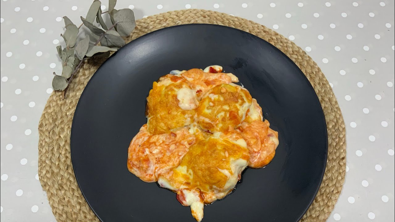 Huevos rellenos gratinados