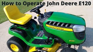 How to operate a John Deere E120 tractor