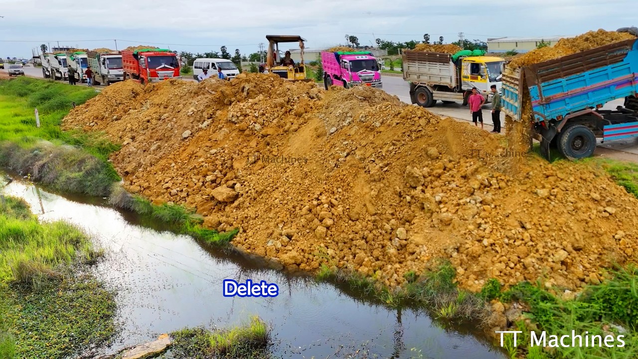 Great Team Work Mix Color Dump Trucks Waiting Unload Along High Way Road Filling Small Land Size