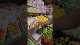 Shopping for produce at an Asian market (Lam's) in Seattle.
