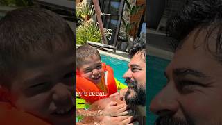 Burak Ozcivit Teaching Boy to Swim