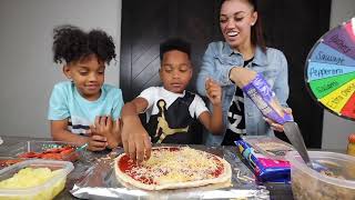 SPIN THE MYSTERY WHEEL PIZZA CHALLENGE | The Prince Family Clubhouse