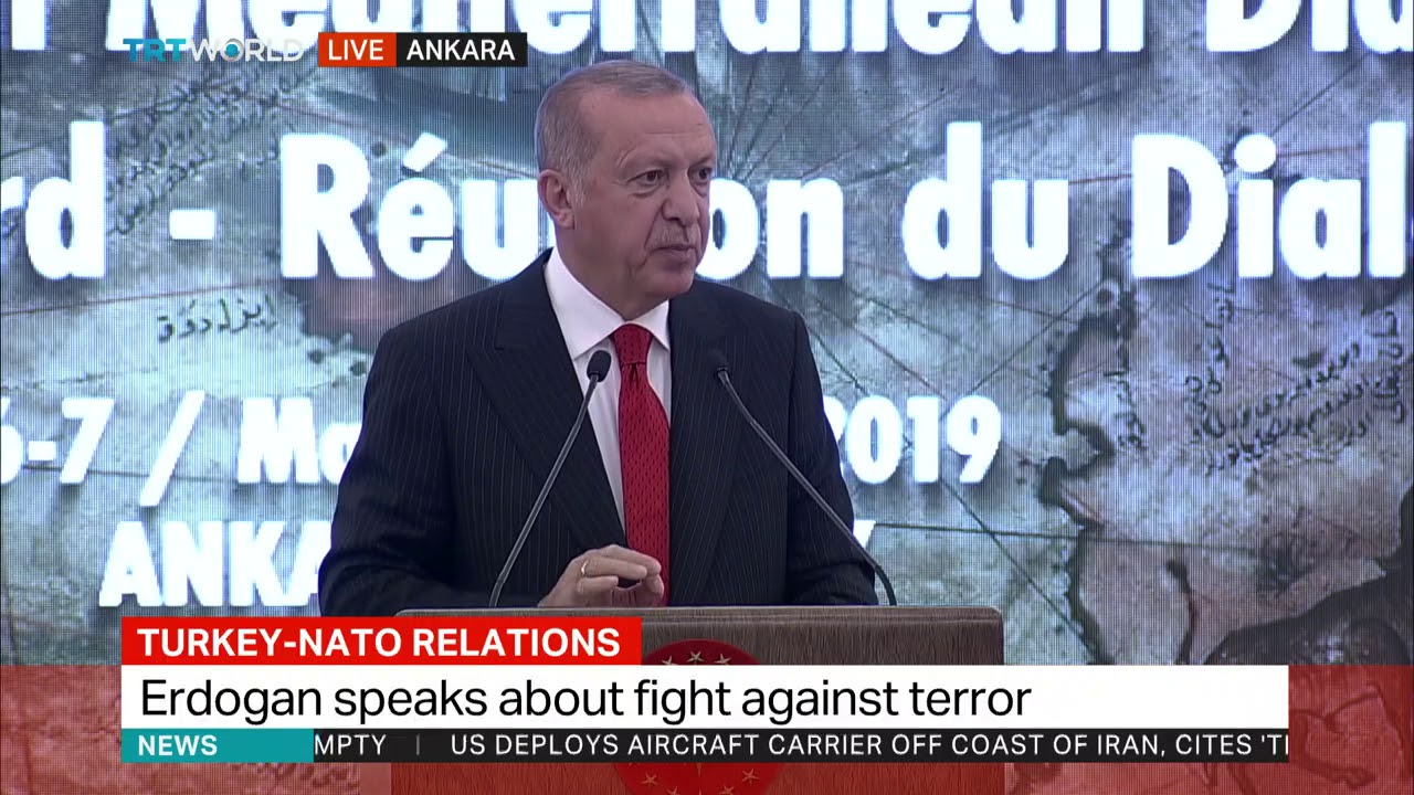 Turkey's Erdogan speaks in Ankara newspaper mockup