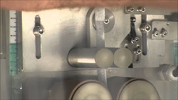 Silica gel sachet inserter machine