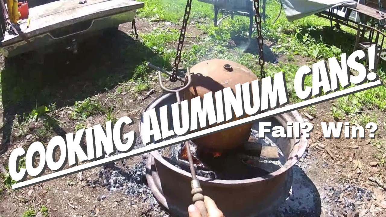 Melting aluminum cans over the fire pit in a propane tank. Trying to