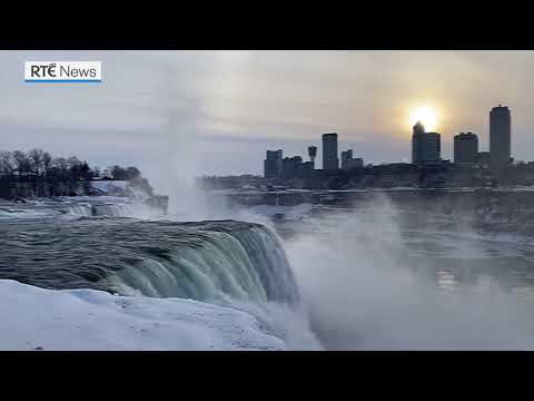 Frozen Falls: Rainbow brightens sky over icy Niagara