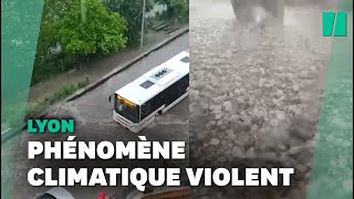 Orage et gre?le a? Lyon, un torrent de pluie dans les rues de la ville