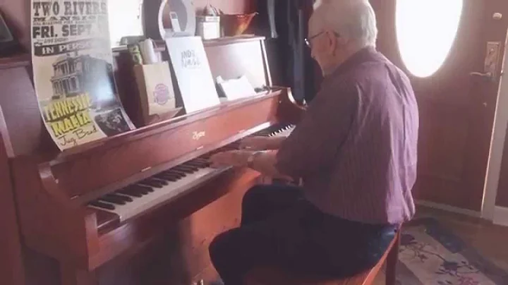Reminiscing on the piano with neighbor Jack Puckett