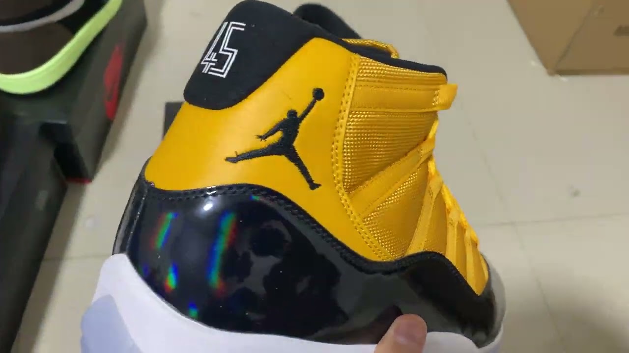 jordan 11 black yellow