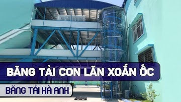 Băng tải con lăn xoắn ốc chuyển hàng từ trên cao xuống thấp - Băng tải Hà Anh