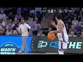 Kansas State's Markquis Nowell having a fake argument with his coach