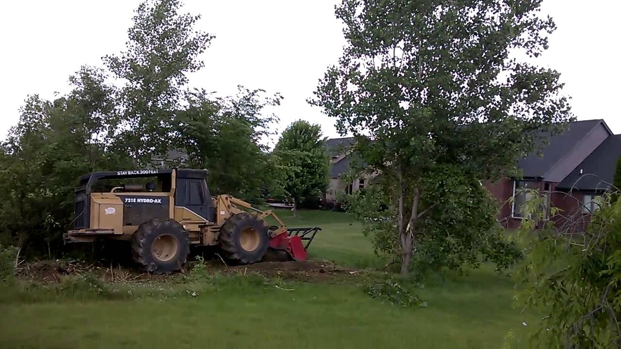 721E HYDROAX with a FECON head YouTube