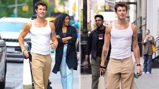 Shawn Mendes showcases his muscular frame in a white tank top while enjoying a shopping trip in NYC