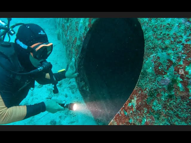 Scuba Diving Inside a Plane Wreck | This is the fi...