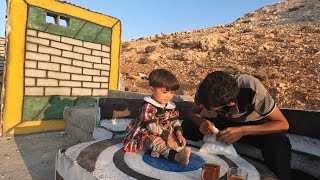 Quick video of covering the walls of the mountain hut with shell: the nomadic lifestyle in Iran