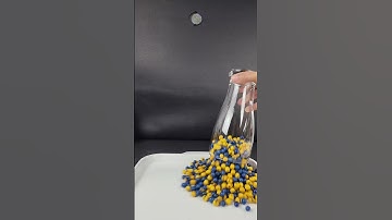 Blue and yellow seed beads in reverse video 🧲  #asmr #satisfying #beads #reverse #shorts