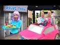 Collecting Uni-Verse Toys at the Pretend Drive-Thru