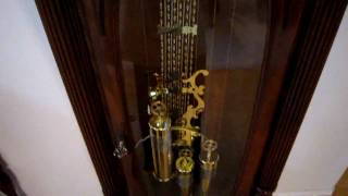 Winding a Grandfather Clock Winding a 8 day Howard Miller Presidential Collection Truman clock - Cable Driven triple Chime.