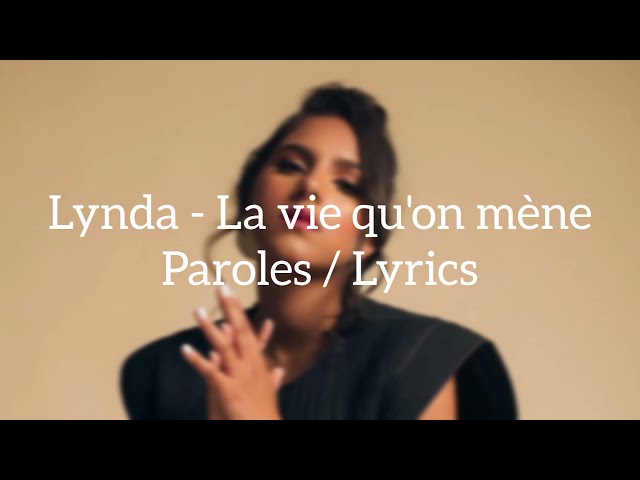 Lynda - La vie qu'on mène Paroles / Lyrics class=