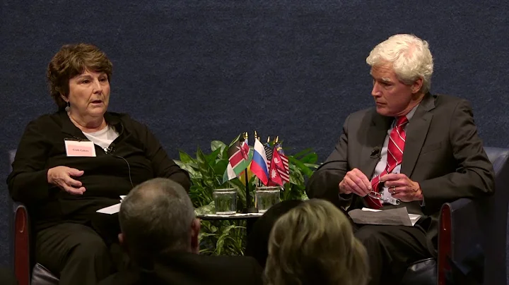 Karen DeYoung speaking with Tim Carrington at the ...
