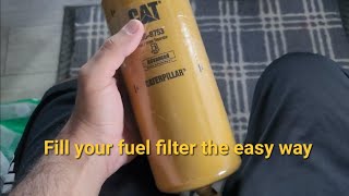 How to fill CAT fuel filter with clean diesel easy way | Caterpillar | Clogged fuel filter by Truckomize 224 views 6 months ago 2 minutes, 13 seconds