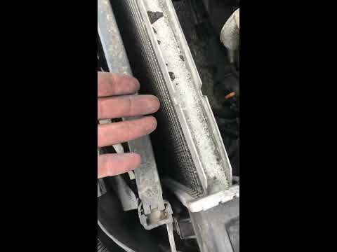 how to remove radiator from 1998 Oldsmobile Aurora