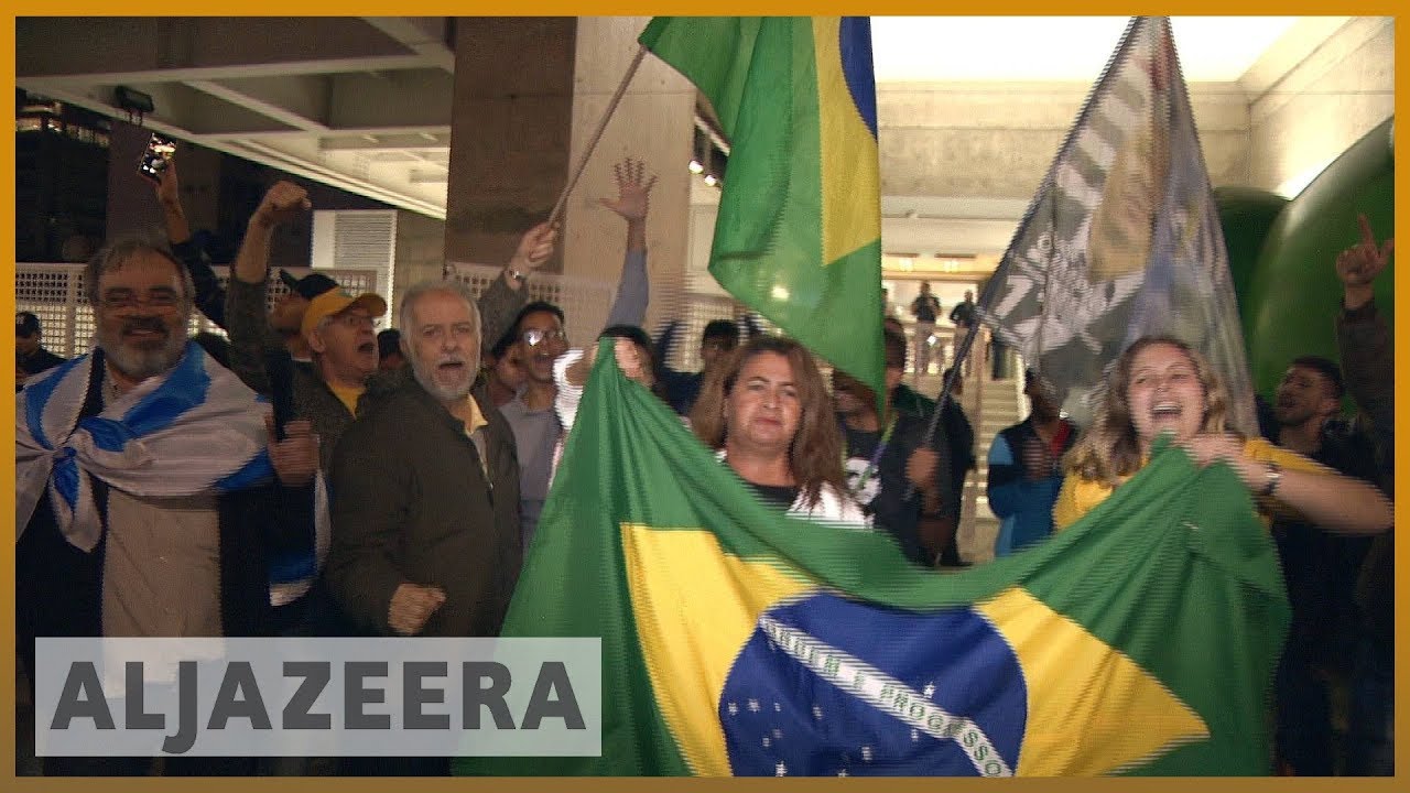 🇧🇷 بولسونارو وحداد يتأهلان للجولة الثانية في الانتخابات الرئاسية | الجزيرة الإنجليزية