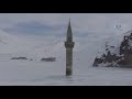 Download Buzlar Arasında Ayakta Duran Minare Buzlar Arasında Ayakta Duran Minare