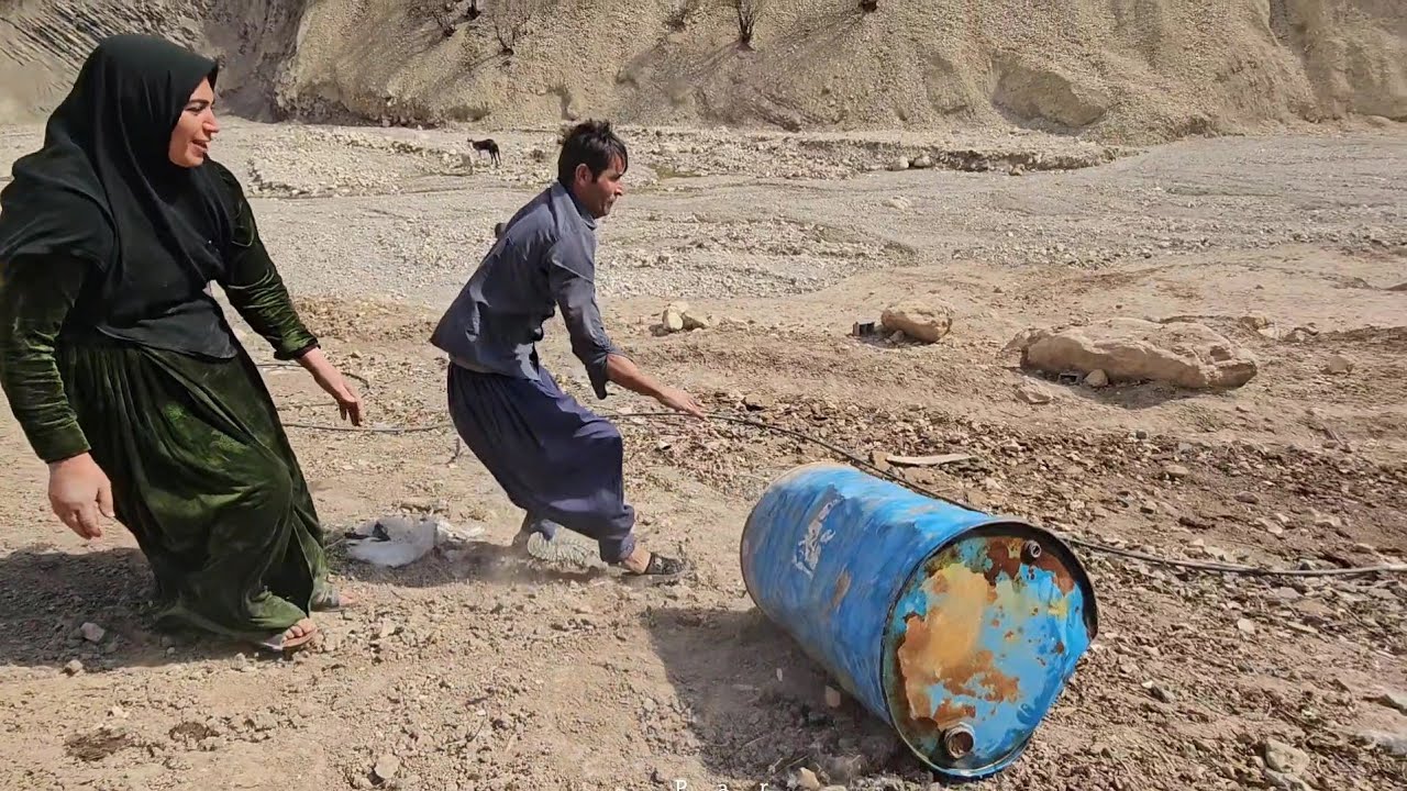 "A rural couple working together on the farm.👩‍🌾👨‍🌾💛 Babak stays with the family."