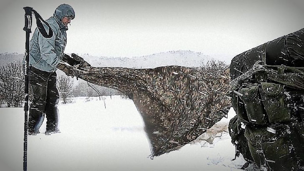 Building a Minimalist Tarp Shelter in a Blizzard