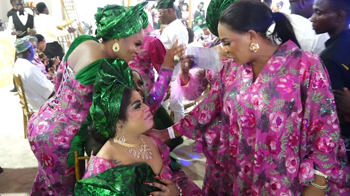 ACTRESS FATHIA BALOGUN AND BOB RISKY SMILE AT EACHOTHER AT THE MOST COLOURFUL WEDDING CEREMONY