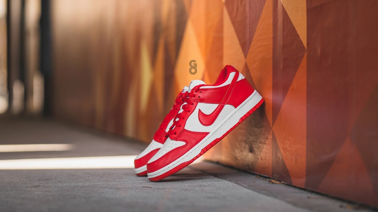 dunk low university red on feet