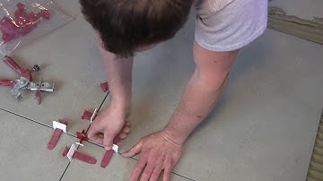 Tiles installation in the Garage floor with T-Lock™ tile leveling system