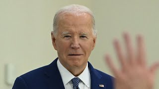 WATCH: Joe Biden attempts to shake hands with no one